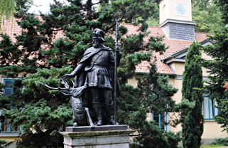Photo Statue mit Jäger und Hirsch